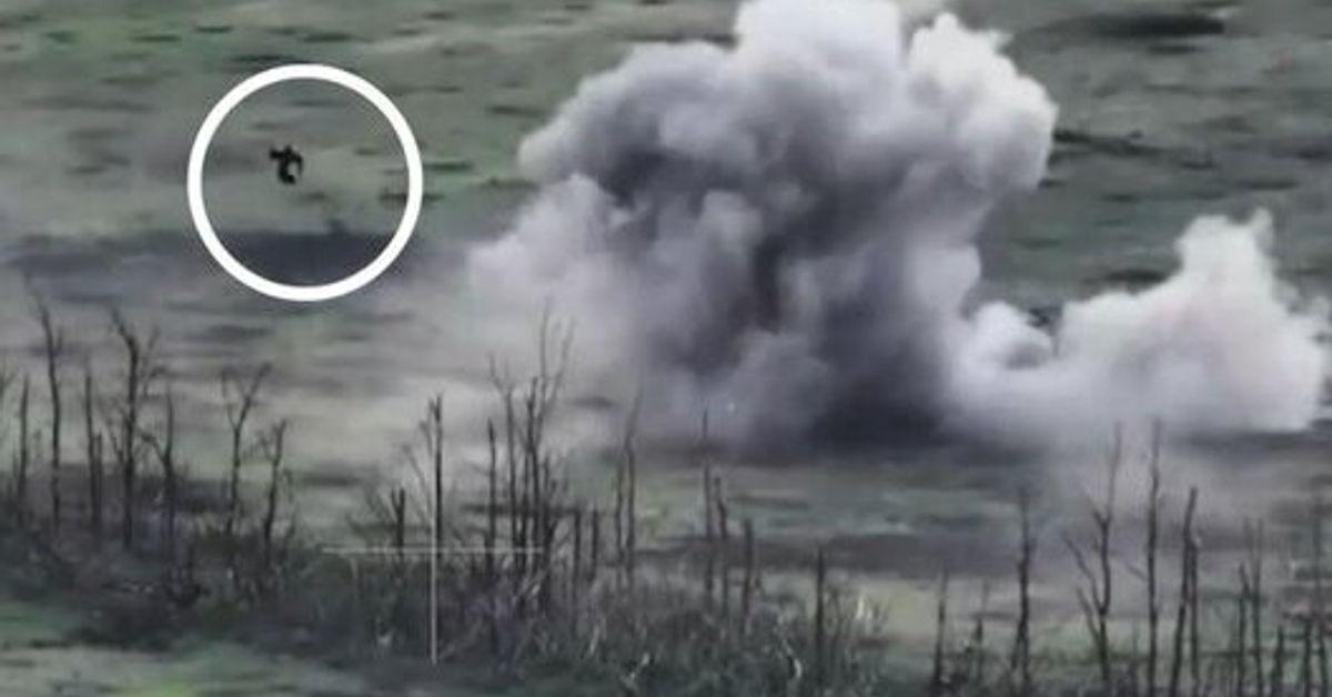 Occupier flies high in air after artillery shell hits Russian armou...