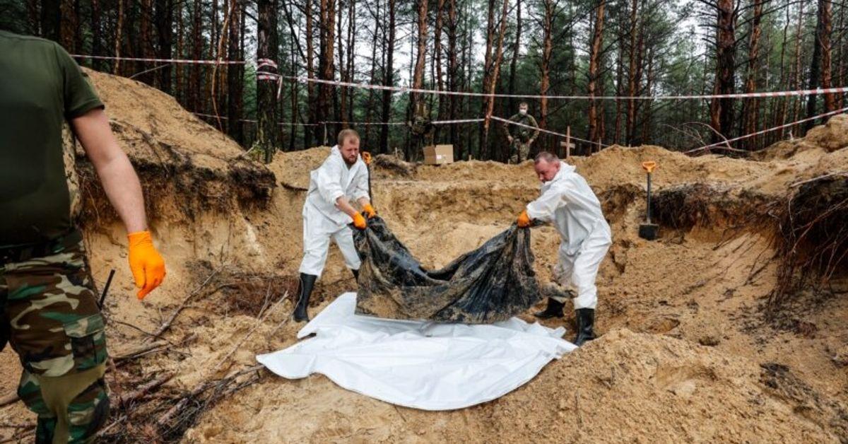 Ukrainian Official Says 436 Bodies Exhumed In Izyum, Including 30 W...